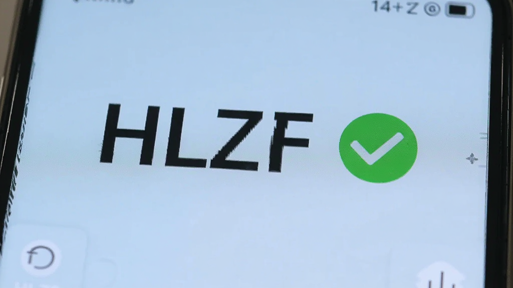 �ֻ���Ļ��ʾHLZFʹ�ù��̽�ͼ������ɾ��޹�浯������������HLZF���ֱ�ʶ���Ա���һ����ɫ�ĶԹ�ͼ���ʾ�޹�棬����Ϊǳ��ɫ�������ˬ�����ʸɾ��޶���Ԫ��