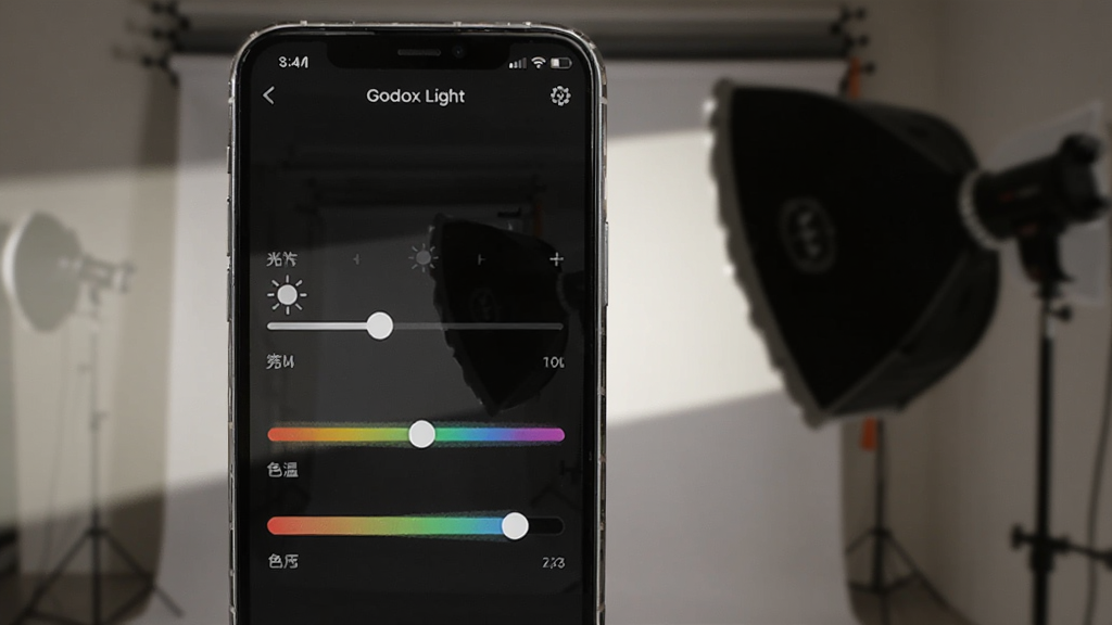 һ��չʾGodox LightʵʱԤ�������ͬ�����ܵ�ͼƬ���������ֻ���Ļ��ʾGodox LightӦ�ý��棬�������������ȵ��ڻ����ɫ�µ���������Ļ����ʾ�Ĺ���Ч���뱳����ʵ����Ӱ�ƵĹ��߱仯��ȫͬ����������ֱ�����������ʸɾ��޶���Ԫ��